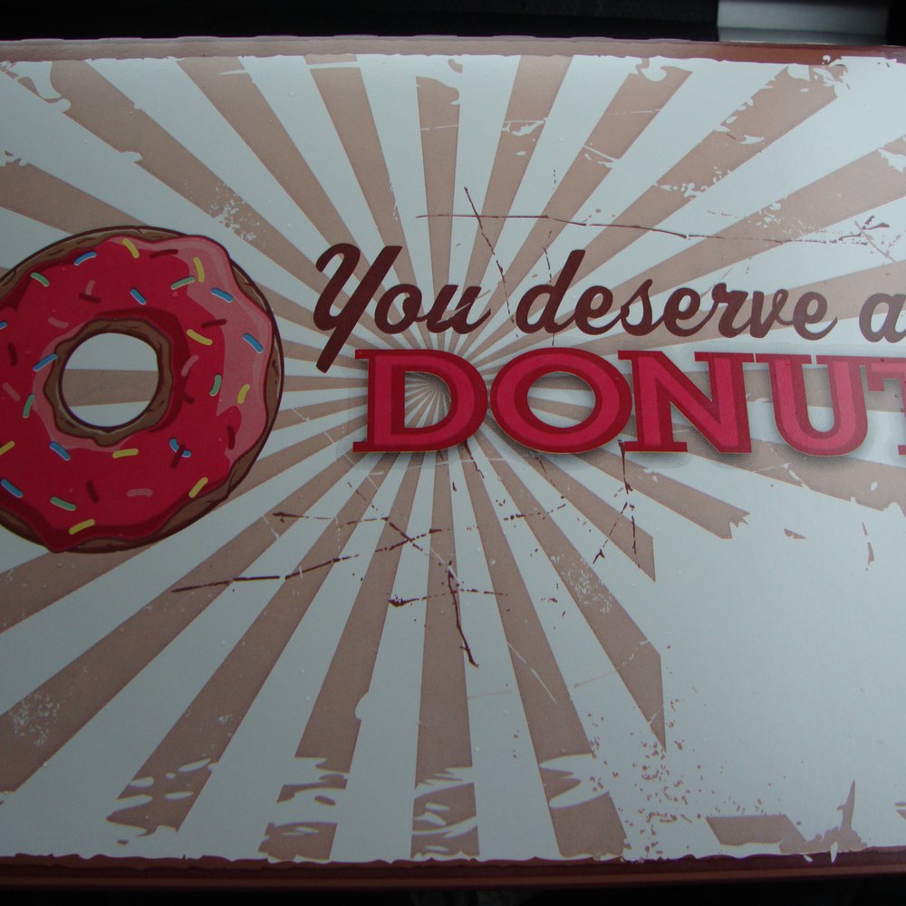 The Donut House - The packaging box when you opt for a dozen donuts from Donut House April 20th 2013. - Donuts Near Me - Aurora, Colorado The Donut House - The packaging box when you opt for a dozen donuts from Donut House April 20th 2013. - Donuts Near Me - Aurora, Colorado