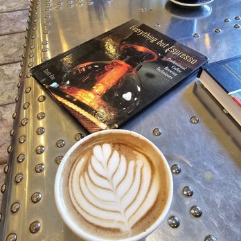 Rosetta Coffee Brewing Company - Aztec Mocha on a Plane wing table - Coffee & Tea Near Me - Capistrano Beach, California Rosetta Coffee Brewing Company - Aztec Mocha on a Plane wing table - Coffee & Tea Near Me - Capistrano Beach, California
