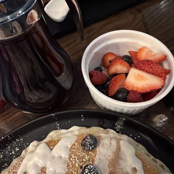 The Mill - Blueberry lemon glaze pancakes and mixed berry side salad. - Breakfast & Brunch Near Me - Mansfield, Texas The Mill - Blueberry lemon glaze pancakes and mixed berry side salad. - Breakfast & Brunch Near Me - Mansfield, Texas