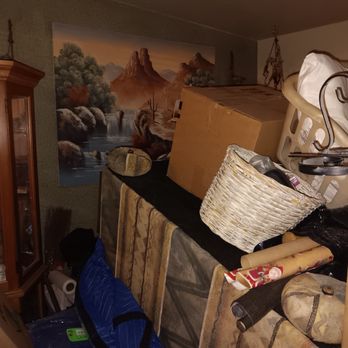Steamy Concepts - Nice pack job right, this is my living room furniture, end tables, lamps, personal items, pictures, nic-naks etc: looks like a dump pile. - Carpet Cleaning Near Me - Tucson, Arizona