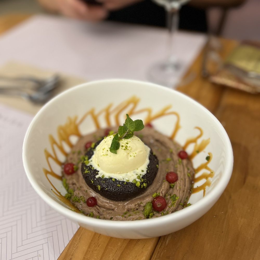 La Brunilda - Chocolate Lava Cake with Hazelnut - Tapas Bars Near Me - Seville, SE La Brunilda - Chocolate Lava Cake with Hazelnut - Tapas Bars Near Me - Seville, SE