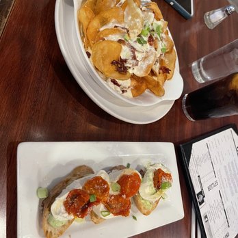 Sitting Duck Tavern - Nachos and burratta salad - New American Near Me - Stratford, Connecticut Sitting Duck Tavern - Nachos and burratta salad - New American Near Me - Stratford, Connecticut
