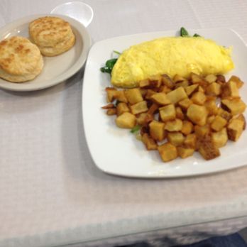 Family Table Cafe - Mushroom, spinach & feta omelet with home fries and biscuits. - Breakfast & Brunch Near Me - Auburn Hills, Michigan Family Table Cafe - Mushroom, spinach & feta omelet with home fries and biscuits. - Breakfast & Brunch Near Me - Auburn Hills, Michigan