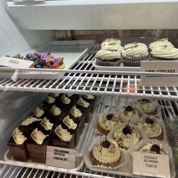 Violettes Bakery Cafe - Todays treats were a fruit tart, chocolate cupcake, Valrhona mousse chocolate, and cherry almond tart! - Bakeries Near Me - Clarkdale, Arizona Violettes Bakery Cafe - Todays treats were a fruit tart, chocolate cupcake, Valrhona mousse chocolate, and cherry almond tart! - Bakeries Near Me - Clarkdale, Arizona