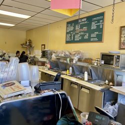 Lombardo's Gourmet Deli and Meats - Deli section and cash register