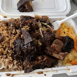 Oxtail with rice and peas, and steamed vegetables, extra oxtail gravy Oxtail with rice and peas, and steamed vegetables, extra oxtail gravy