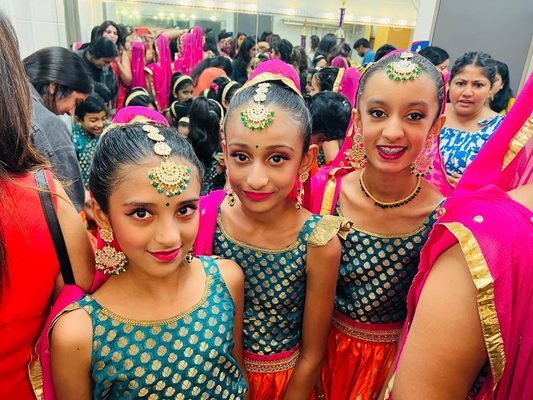 Kids Classes - Bollywood Dance Central offers kids classes. Our minis class is ages 3-5, juniors class is ages 6-8, pre-teens class is ages 9-12, and senior company class is ages 13-18. We focus on bollywood dance fundamentals in these classes. All students will have 2-3 performance opportunities through these classes as well.
Introducing a magical journey for your little ones with our Bollywood Kids Dance Classes! 🎉 Watch as they twirl, groove, and laugh while discovering the vibrant world of Bollywood rhythms. Kids Classes - Bollywood Dance Central offers kids classes. Our minis class is ages 3-5, juniors class is ages 6-8, pre-teens class is ages 9-12, and senior company class is ages 13-18. We focus on bollywood dance fundamentals in these classes. All students will have 2-3 performance opportunities through these classes as well.
Introducing a magical journey for your little ones with our Bollywood Kids Dance Classes! 🎉 Watch as they twirl, groove, and laugh while discovering the vibrant world of Bollywood rhythms.