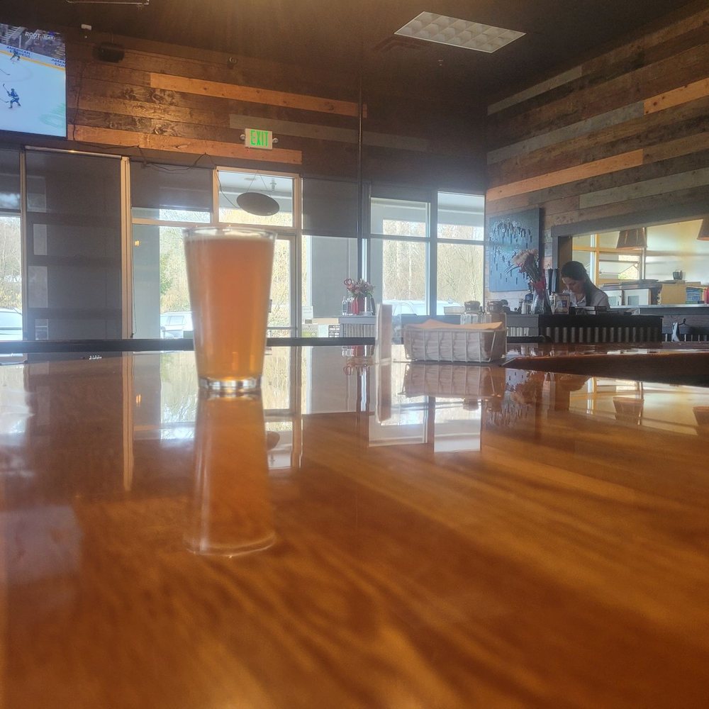The view from coming back from the bathroom. Love the bartender!