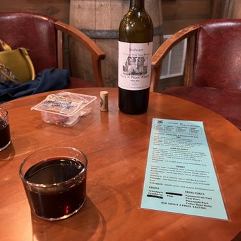 Rock N Wool Winery - a bottle of wine and two glasses of wine - Wineries Near Me - Poynette, Wisconsin