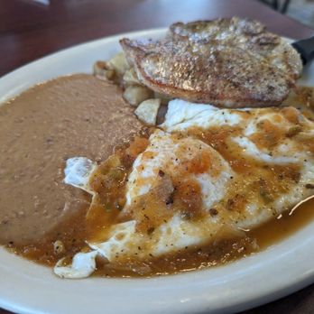 Taqueria Los Dos Laredos - Huevos Rancheros w pork chop - Mexican Near Me - San Antonio, Texas Taqueria Los Dos Laredos - Huevos Rancheros w pork chop - Mexican Near Me - San Antonio, Texas