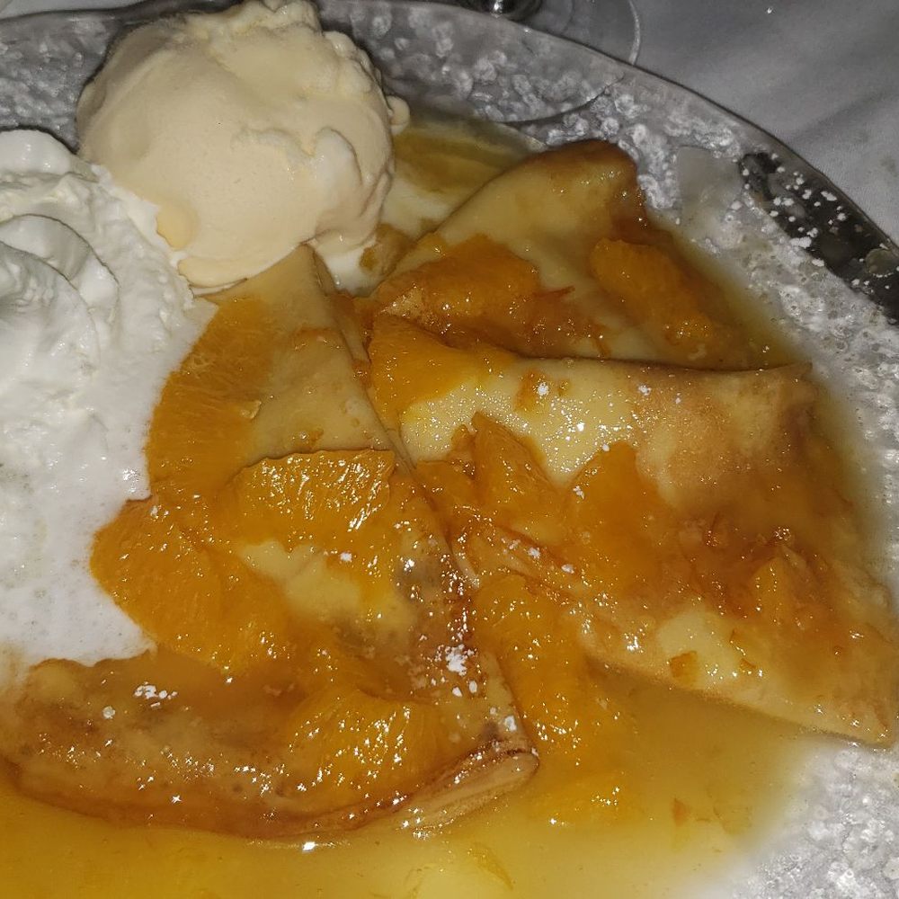 Suzette's Creperie - Beautiful crepe suzette for dessert. At this point in the tea service, I was happy to get a full plate of food. It was very delicious. - French Near Me - Wheaton, Illinois Suzette's Creperie - Beautiful crepe suzette for dessert. At this point in the tea service, I was happy to get a full plate of food. It was very delicious. - French Near Me - Wheaton, Illinois
