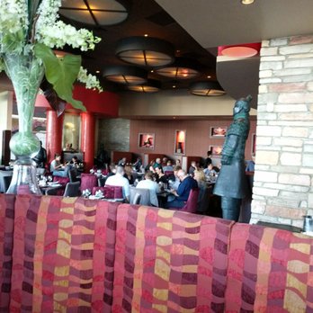 Rouge - a restaurant with a large group of people sitting at tables - Asian Fusion Near Me - Brossard, Quebec