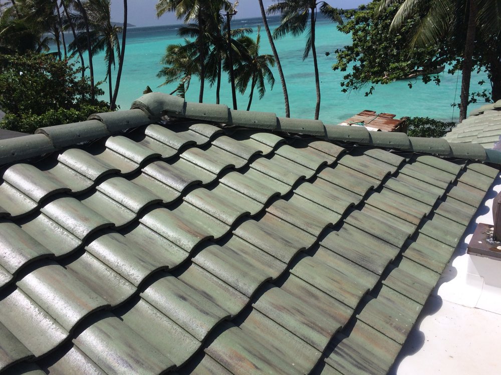 Slide of Surface Shield Roofing Company