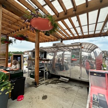 Sonny's - a vintage airstream parked under a pergol roof - Cocktail Bars Near Me - Omaha, Nebraska Sonny's - a vintage airstream parked under a pergol roof - Cocktail Bars Near Me - Omaha, Nebraska