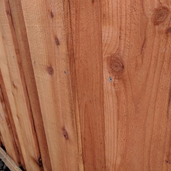 Aron Ambrus Construction - Screws were added halfway down each board. As the fence settles over the years, now the boards will not separate. - Decks & Railing Near Me Aron Ambrus Construction - Screws were added halfway down each board. As the fence settles over the years, now the boards will not separate. - Decks & Railing Near Me