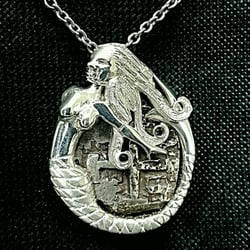Nassau Jewelry - Silver mermaid draped around a 1500's Era shipwreck coin.