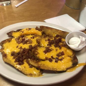 Texas Roadhouse - Potatoe skins .. way too much cheese but tasty - American Near Me - Nottingham, Maryland Texas Roadhouse - Potatoe skins .. way too much cheese but tasty - American Near Me - Nottingham, Maryland