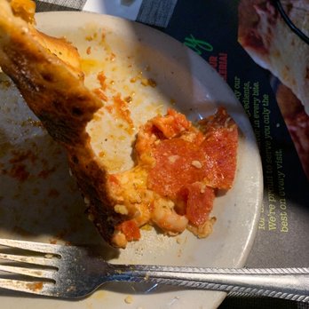 Giovanni's Italian Restaurant - Oily slice of pepperoni pizza - Italian Near Me - Sylacauga, Alabama Giovanni's Italian Restaurant - Oily slice of pepperoni pizza - Italian Near Me - Sylacauga, Alabama