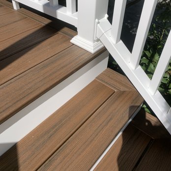 MKJC Carpentry - a close up of a wooden deck - General Contractors Near Me - Saugus, Massachusetts