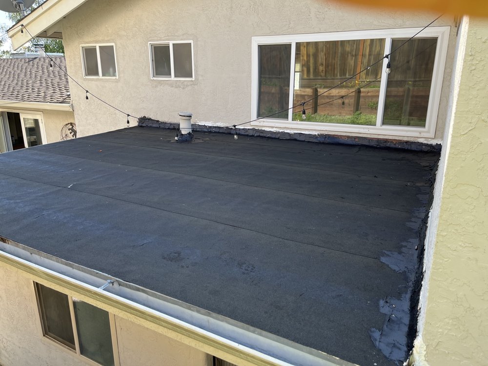 Slide of Nicks roofing and tree services