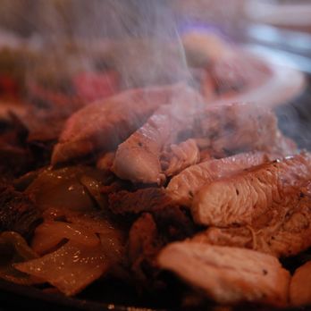 El Conquistador Restaurant - a plate of food being cooked - Mexican Near Me - Waco, Texas El Conquistador Restaurant - a plate of food being cooked - Mexican Near Me - Waco, Texas