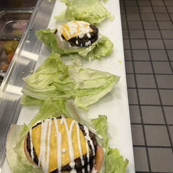 Juicy Burger 2 - a row of lettuce leaves - Burgers Near Me - Fresno, California