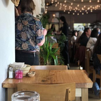 Clavel - The atmosphere is warm and casually hip. You immediately feel like an insider once you've stepped into Clavel. - Bars Near Me - Baltimore, Maryland Clavel - The atmosphere is warm and casually hip. You immediately feel like an insider once you've stepped into Clavel. - Bars Near Me - Baltimore, Maryland