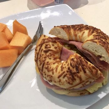 Coffee Cup - Bagel Mexicano. Ham, egg, jalapeños, tomato, cheese, red onions. - Breakfast & Brunch Near Me - Puerto Vallarta, JAL Coffee Cup - Bagel Mexicano. Ham, egg, jalapeños, tomato, cheese, red onions. - Breakfast & Brunch Near Me - Puerto Vallarta, JAL