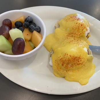 Eggs Up Grill - Eggs Benedict w/ side Fresh Fruit Bowl - Breakfast & Brunch Near Me - Savannah, Georgia Eggs Up Grill - Eggs Benedict w/ side Fresh Fruit Bowl - Breakfast & Brunch Near Me - Savannah, Georgia