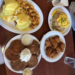 Crab Cake Benedict Island Style, Fried Rice & Eggs, fried Chicken Wings and malasada pancakes