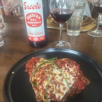 Sorci's Italian Cafe & Enoteca - Lasagna with a bottle of Barbera - Italian Near Me - Sumner, Washington