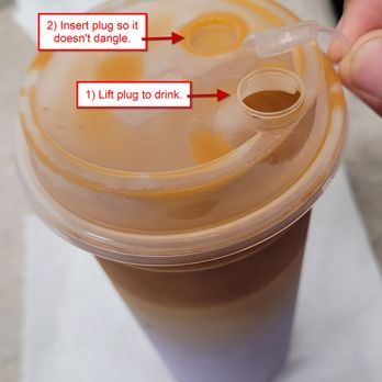Eastern Tales Thai tea - I like their cup lid cover design. Lift seal to drink. Plug the seal into side hole for comfort. Straw recommended for drinking. - Bubble Tea Near Me - Santa Ana, California