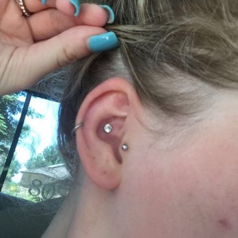 Anchors Away Tattoo Parlor - This was what my conch looked like only about a day of having it... this was the earring he pierced me with. - Tattoo Near Me - Lodi, California