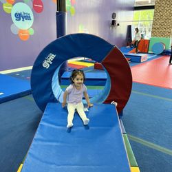 The Little Gym of Cedar Park - Sometimes she does a flip, and sometimes she slides down!