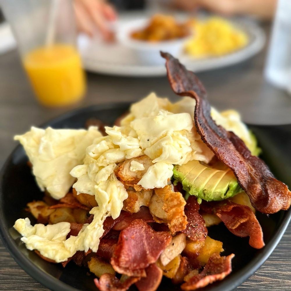 Downtown Diner - a plate of bacon, eggs, and hash browns - Diners Near Me - Celebration, Florida Downtown Diner - a plate of bacon, eggs, and hash browns - Diners Near Me - Celebration, Florida