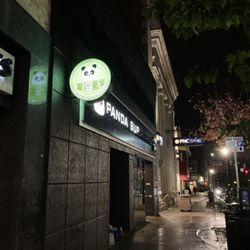 Panda Supermarket - Store sign at night
