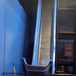 Sky Zone Trampoline Park - Slide. Exhilarating but the mat can escape you and cause you to scrape your elbow