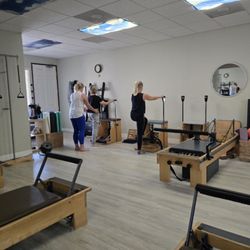 Pilates & Beyond Studio - Heidi teaching a duet on the Wunda Chairs. This exercise is for alignment and balance