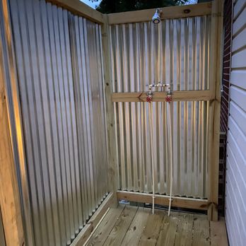 Maven Construction - a wooden deck with a shower - General Contractors Near Me Maven Construction - a wooden deck with a shower - General Contractors Near Me