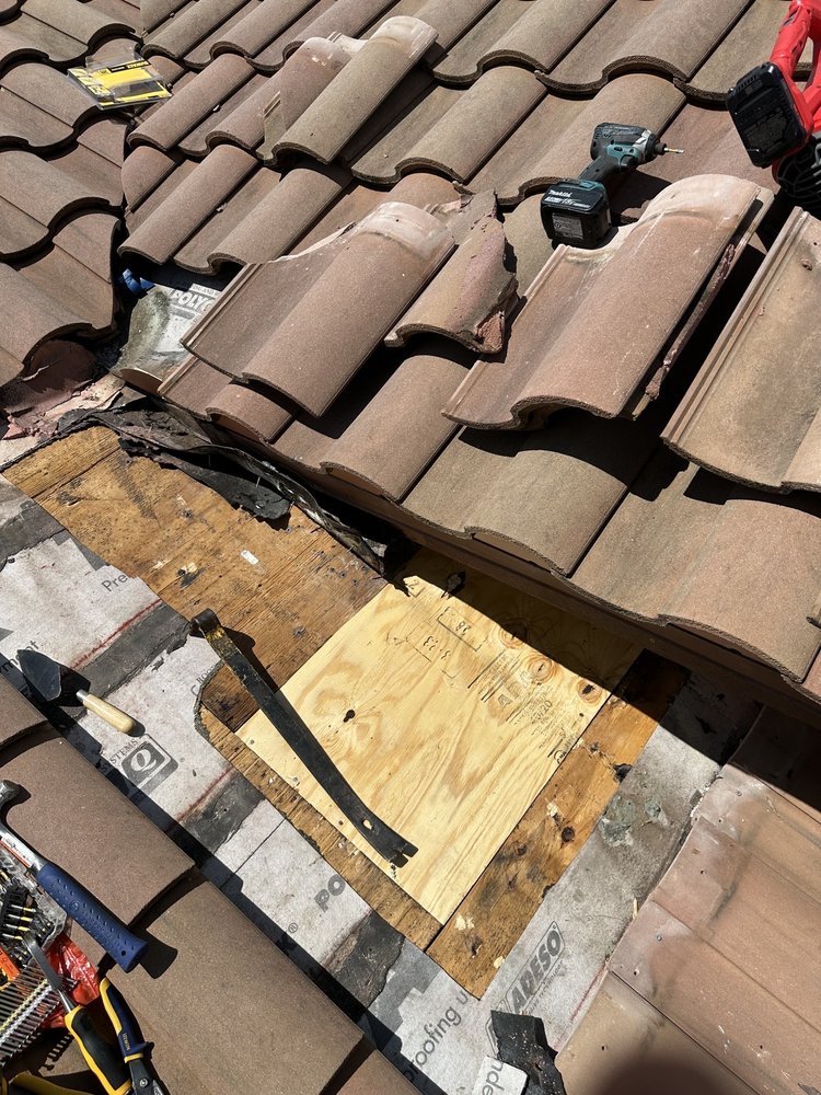 Slide of MC Roofing Service