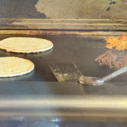 King Kebab - Pita bread and shawarma meat on the grill