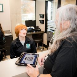 Pure Life Chiropractic - Patients check in on i-pads when they arrive