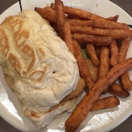 Shrimp poorboy and sweet potato fries. Shrimp poorboy and sweet potato fries.