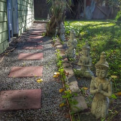 Sacred Body Massage & Healing Arts on Folly - Follow the path around the side of the house...