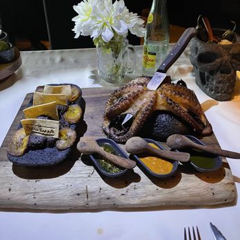 La Buena Barra - Grilled octopus with refried beans and 3 different salsas! Yummy - Bars Near Me - Cancún, ROO La Buena Barra - Grilled octopus with refried beans and 3 different salsas! Yummy - Bars Near Me - Cancún, ROO