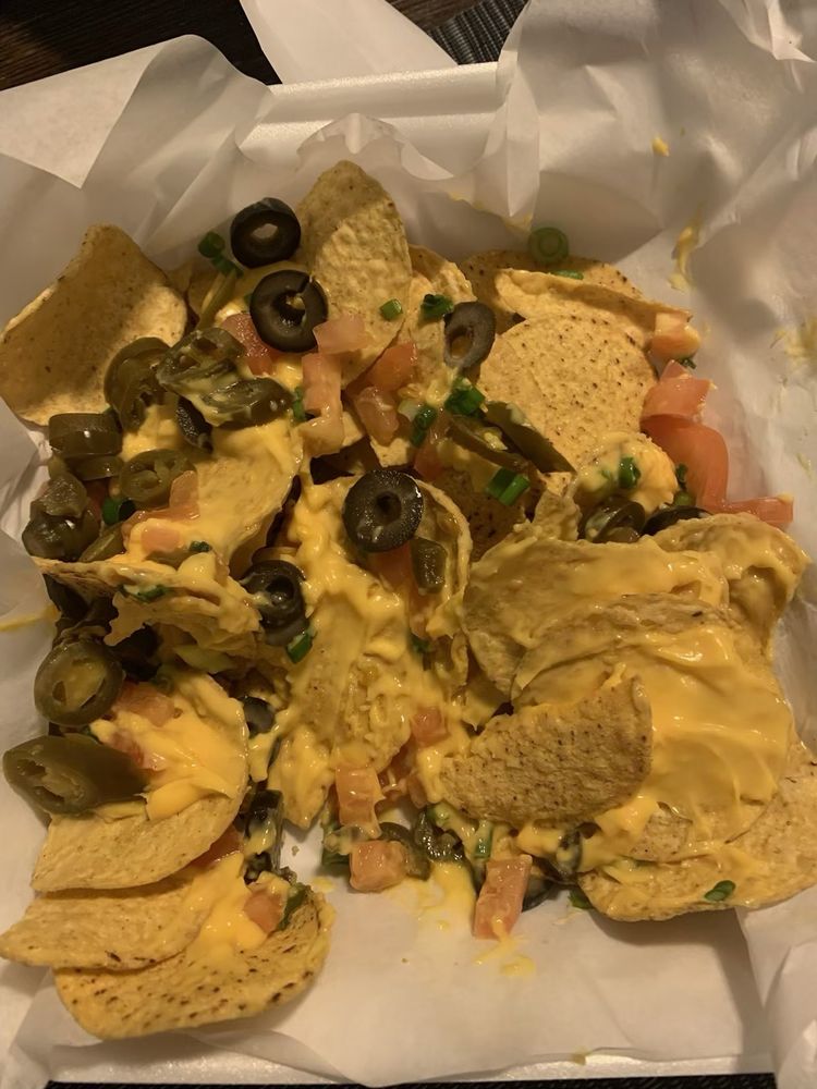 PUTTERS BAR & GRILL Updated September 2024 23 Reviews 3055 E Flamingo Rd, Las Vegas