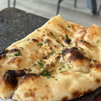 Kismet Modern Indian - Garlic naan - Indian Near Me - Richmond, Virginia Kismet Modern Indian - Garlic naan - Indian Near Me - Richmond, Virginia