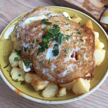La Cantina - Patatas bravado with duck egg - Bars Near Me - Stockport, XGM