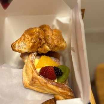Paris Baguette - Croissant hot dog and fruit pastry - yes, I bit into the hot dog :p - Bakeries Near Me - Parker, Colorado Paris Baguette - Croissant hot dog and fruit pastry - yes, I bit into the hot dog :p - Bakeries Near Me - Parker, Colorado