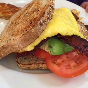 Hen House Eatery - Bacon, egg, avocado, cream cheese and tomatoes on multigrain - Breakfast & Brunch Near Me - Minneapolis, Minnesota Hen House Eatery - Bacon, egg, avocado, cream cheese and tomatoes on multigrain - Breakfast & Brunch Near Me - Minneapolis, Minnesota
